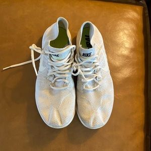 Nike FlyKnit  women’s running shoes- white size 11